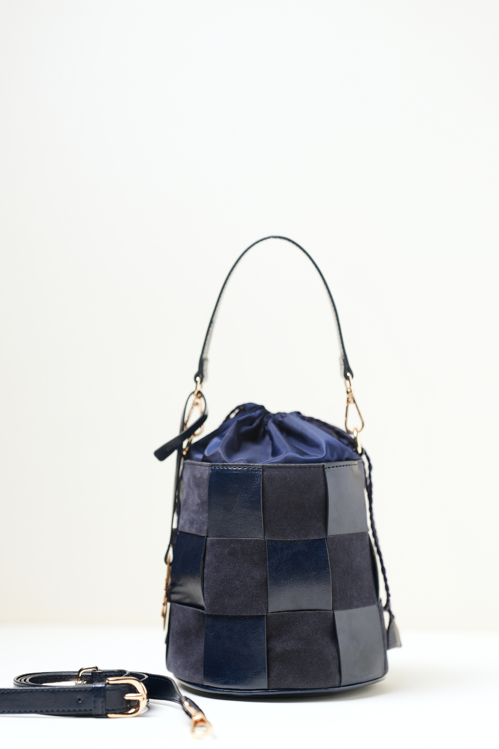 Back view of the Derby Bucket Bag Blue showing clean panel construction and Amrée’s minimal design.