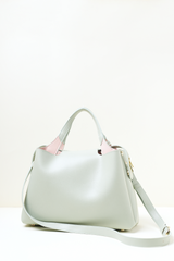 Equitana Top Handle Mint bag photographed to highlight its colour and sleek construction.