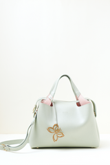 Mint green Equitana top-handle bag showing structured silhouette and premium finish.