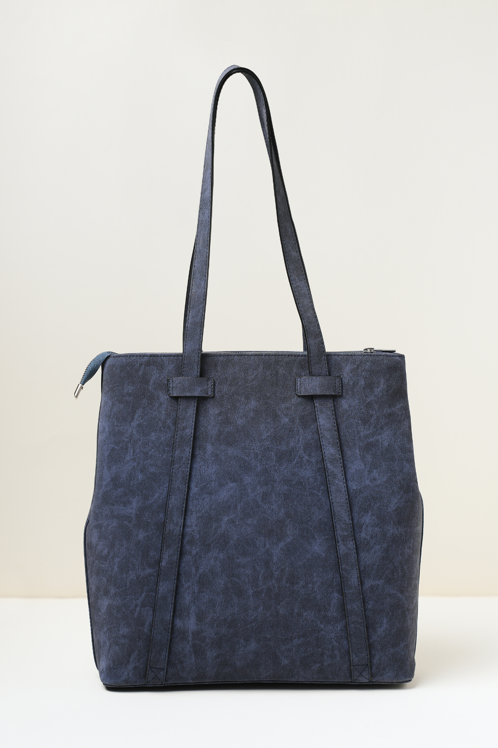 Back panel of the Rodeo Totepack Blue highlighting backpack strap design and clean finish.