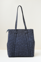 Back panel of the Rodeo Totepack Blue highlighting backpack strap design and clean finish.