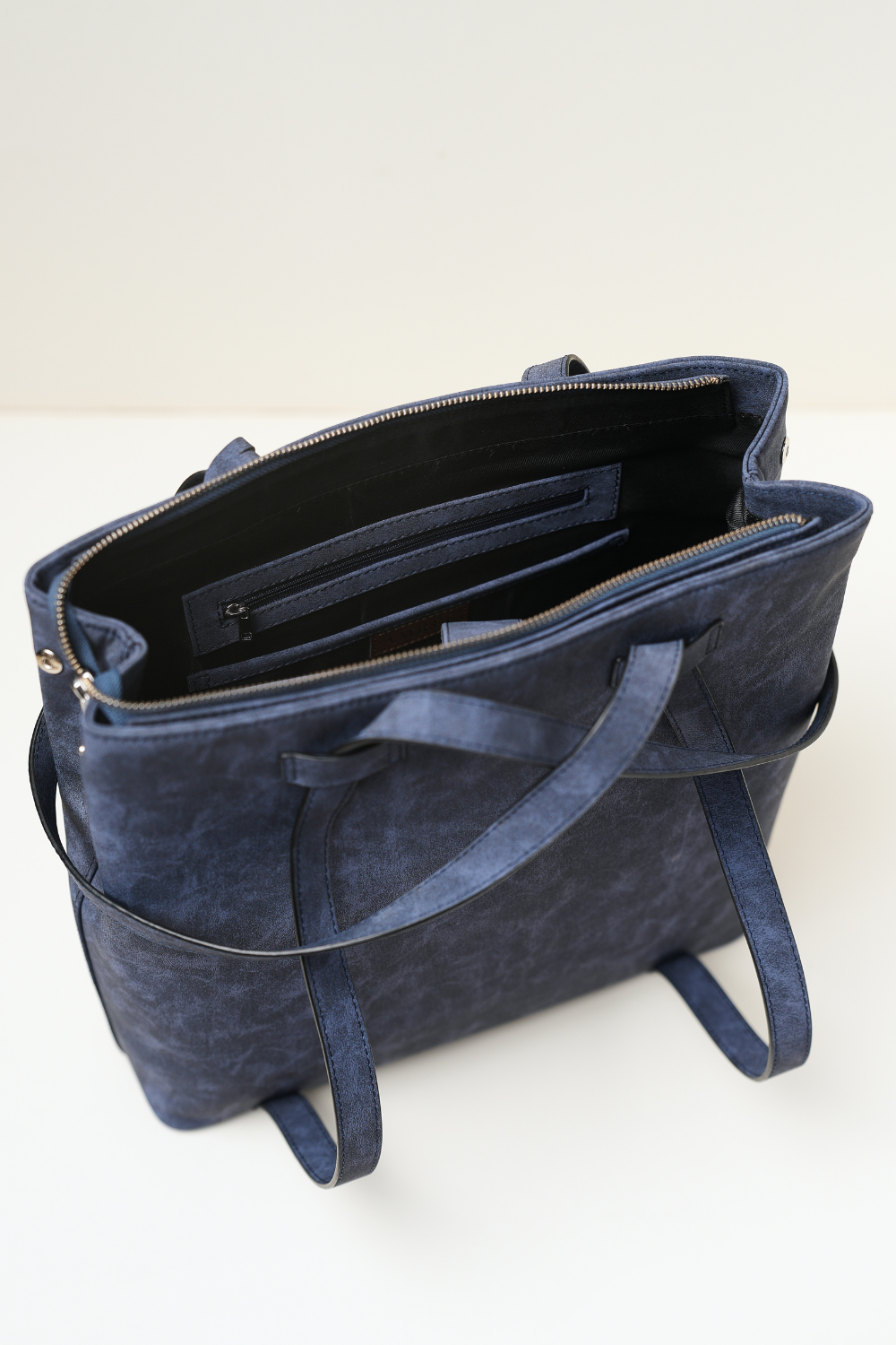 Top-down view of the Rodeo Totepack Blue showing the handle placement and bag opening.