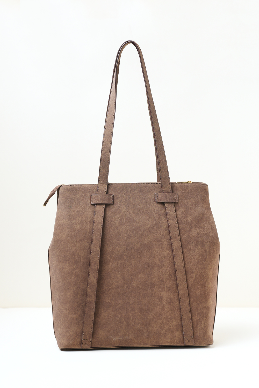 Clear back side view of the Rodeo Totepack Brown showing the backpack straps, panel structure.