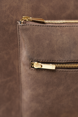 Close-up of the Rodeo Totepack Brown showing the front pocket and zipper chain, highlighting Amrée’s detailing and premium finish.