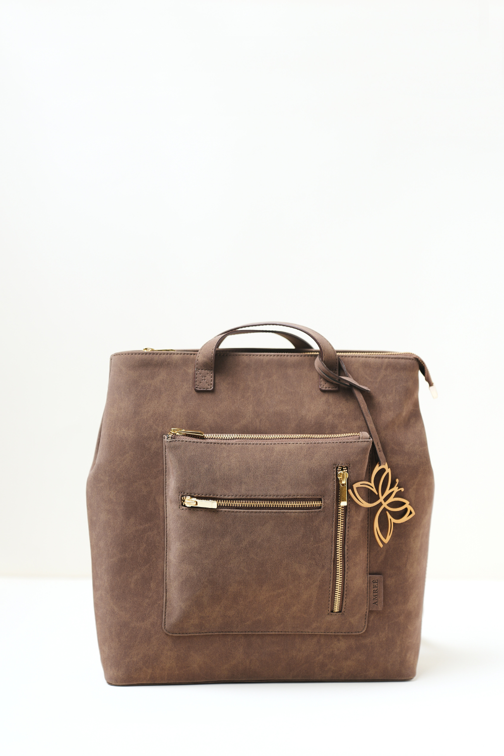 Rodeo Totepack Brown displayed with dual straps showing its tote and backpack functionality.