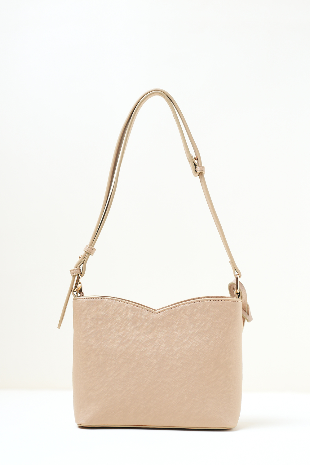 Back view of the Rosette Sling Beige showing the smooth panel back side.