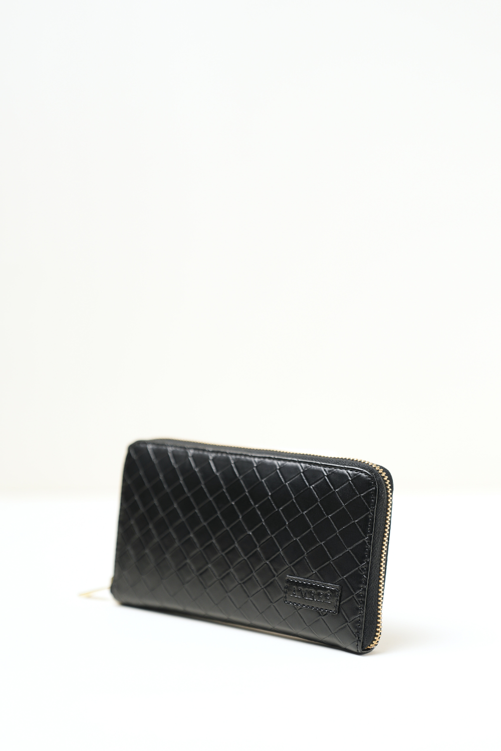The Filly Wallet shown in a full front view highlighting its compact shape and premium finish.